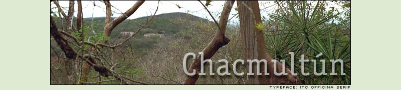 Panoramic view of the reddish stone ruins of Chacmultun