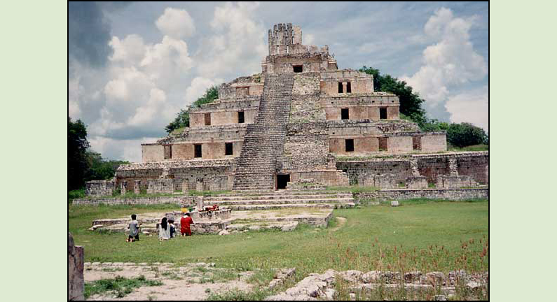 Modern Maya performing Cha Chaac Ceremony in front of the Temple of Five Stories