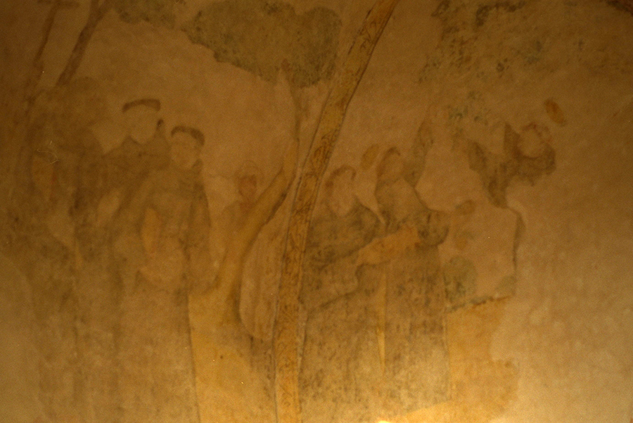Early Mural depicting Franciscan friars, some picking fruits from a tree to offer the Virgin, at the entrance to the cloister at Izamal Basilica