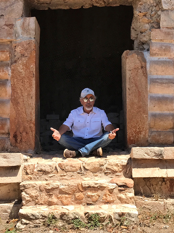 Archaeologist Tomas Gallareta in the doorway of the old throne room, Room 24 of the Palace