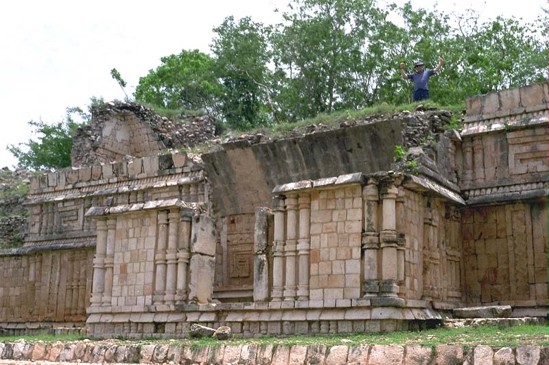 Palace of Labna, Central Patio, view through door of antiroom of the early throne room giving glimplse of decorated throne room wall