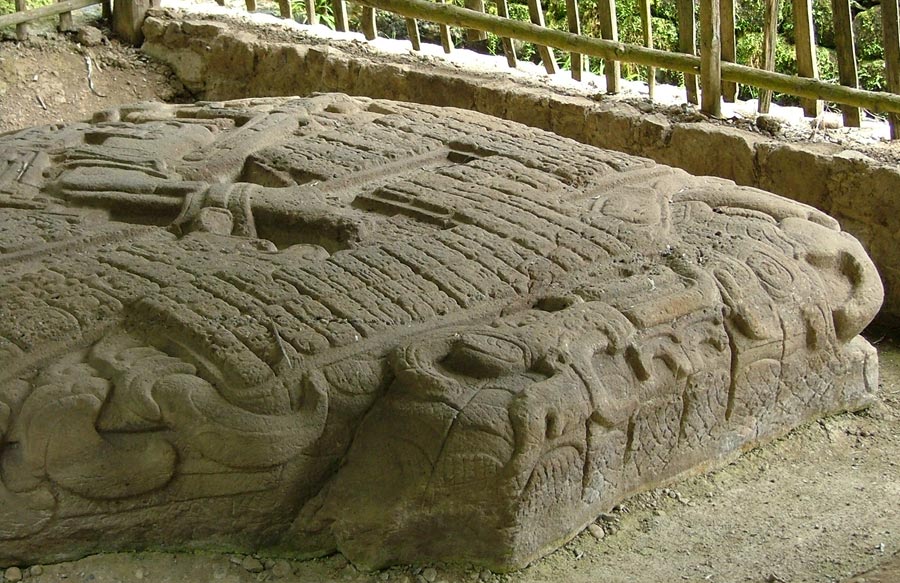 Hieroglyphic text on Altar P surrounding Chac's feet