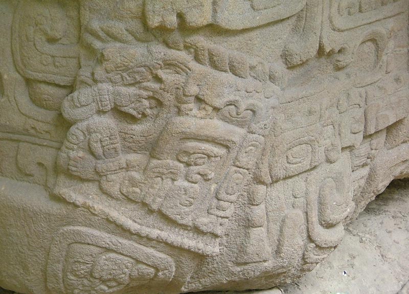 Detail of small cross-legged figure on Zoomorph P