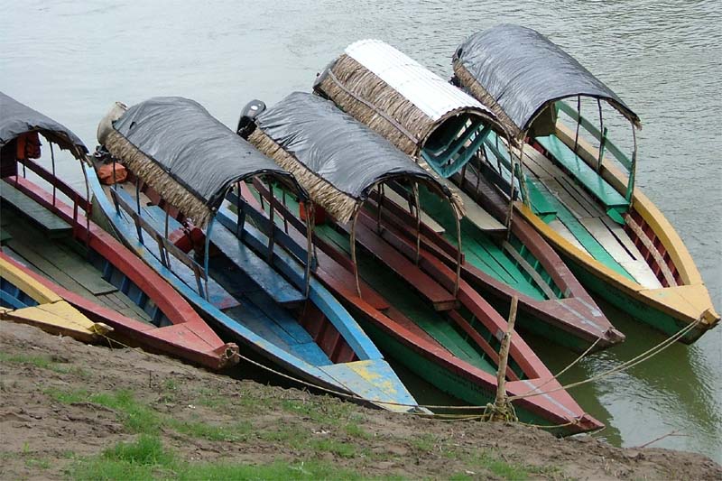 Colorful lanchas transporting visitors on the Usumacinta River